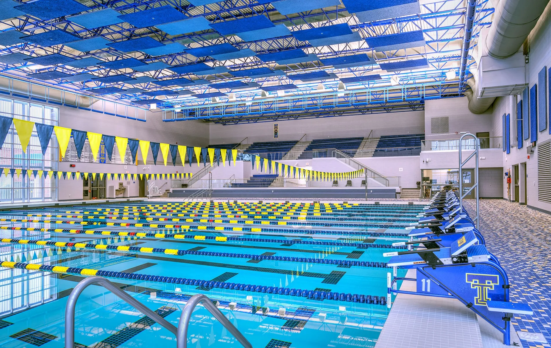 The completed Trenton competition natatorium with starting blocks and tiered seating