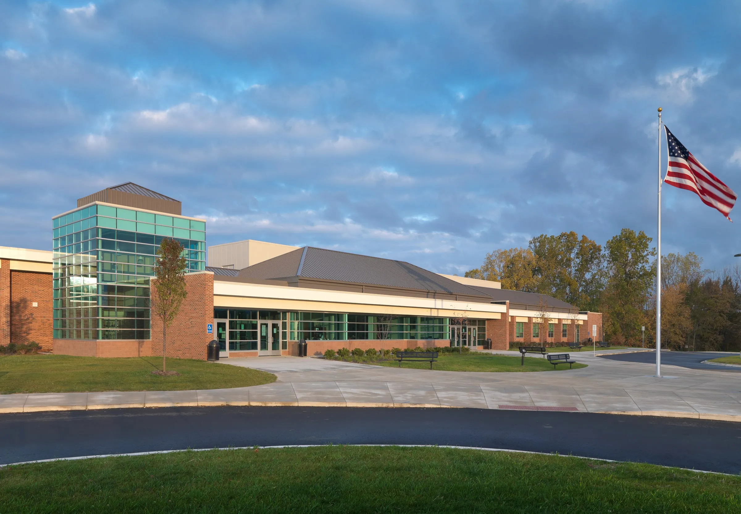 Van Hoosen Middle School entrance with glass tower after renovation